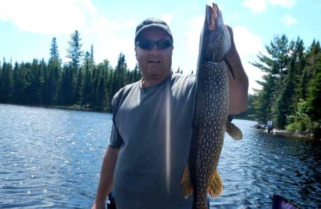 Guest Holding Northern Pike